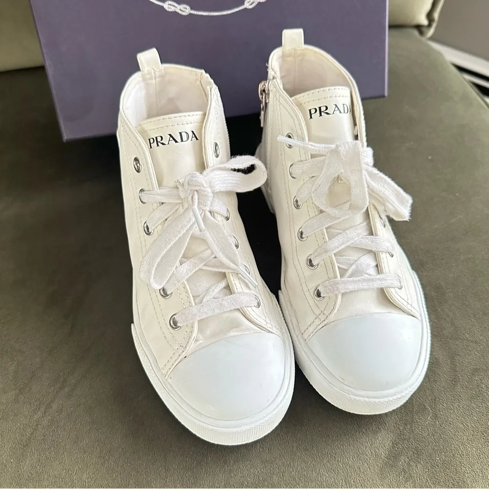 PRADA all white leather high top sneakers size 34 with original box on real real